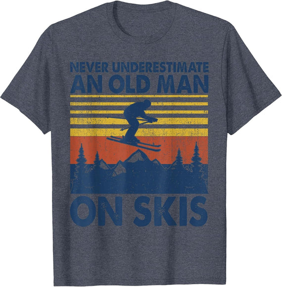 Never Underestimate an Old Man On Skis Funny Winter Sports T-Shirt - Heather Blue