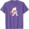 Triple G Mavs Bigfoot Carrying Pig Shirt, Funny Cute Sasquatch Gift T-Shirt - Purple Heather