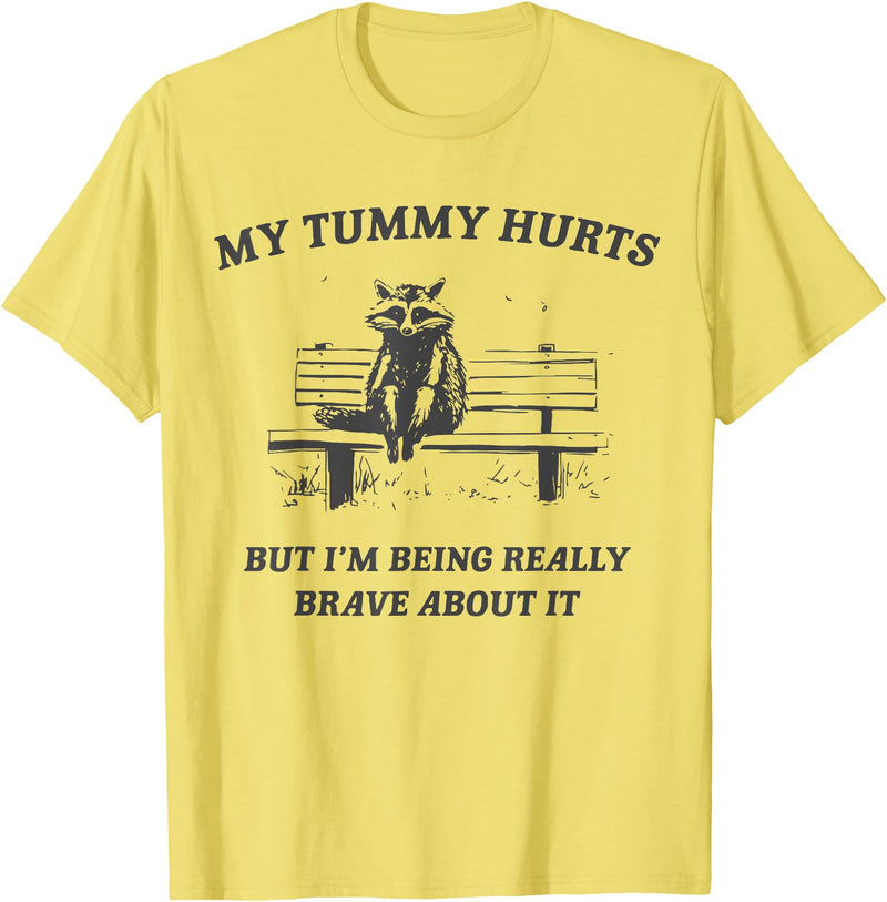 my tummy hurts but i'm being brave about it 2024 My Tummy Hurts but I'm Being Brave About it Raccoon Vintage T-Shirt - Lemon