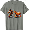 Bigfoot And Scottish Highland Cow Walking Humor Bigfoot Takes Scottish Highland Cow for a Walk T-Shirt - Olive Heather