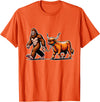 Bigfoot And Scottish Highland Cow Walking Humor Bigfoot Takes Scottish Highland Cow for a Walk T-Shirt - Orange