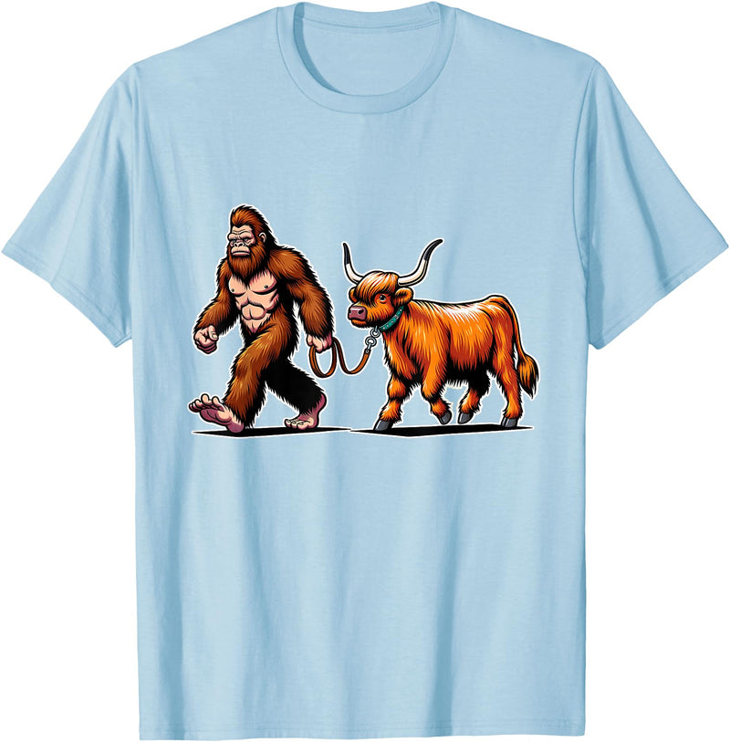 Bigfoot And Scottish Highland Cow Walking Humor Bigfoot Takes Scottish Highland Cow for a Walk T-Shirt - Baby Blue