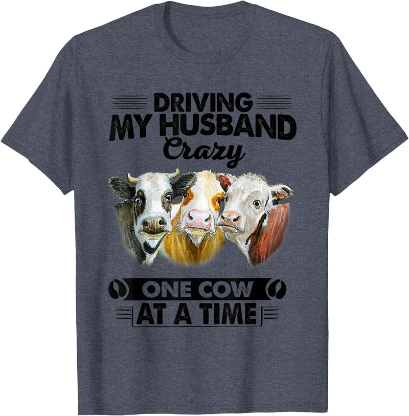 Driving My Husband Crazy One Cow By Dino Driving My Husband Crazy One Cow At A Time Funny Cow T-Shirt - Heather Blue
